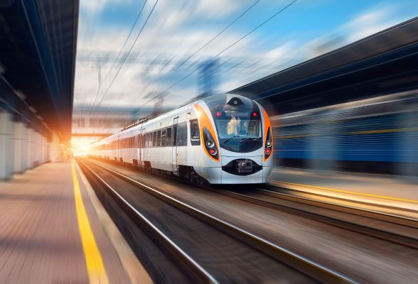 High,Speed,Train,In,Motion,At,The,Railway,Station,At